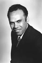 Портрет Алекс Ла Гума