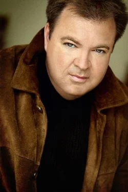 Портрет Томас Гриниас