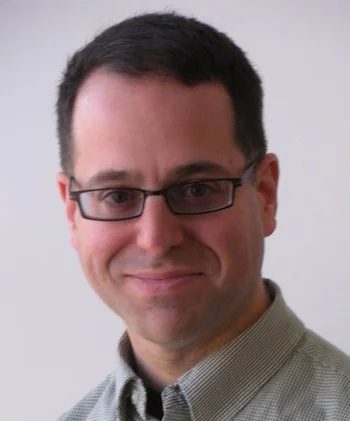 Портрет Томас Лимончелли