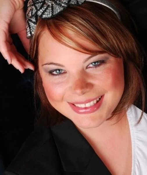 Портрет Поппи Дж. Андерсон