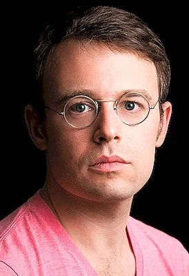 Портрет Джошуа Коэн